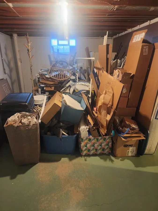 Roll-off dumpster container at job site for Construction Dumpster Rental in Kings Park West